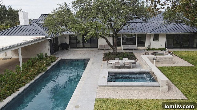 Outdoor spa and pool area, perfect for relaxation.