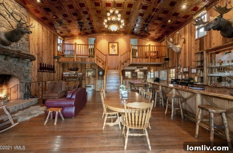 Western-themed interior with a pool table and vintage decor