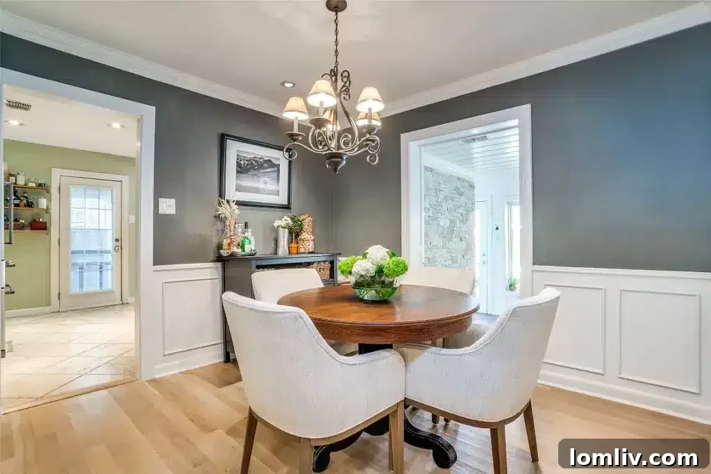 Close-up of the pristine granite countertops and stainless steel sink in the updated kitchen, highlighting quality finishes.