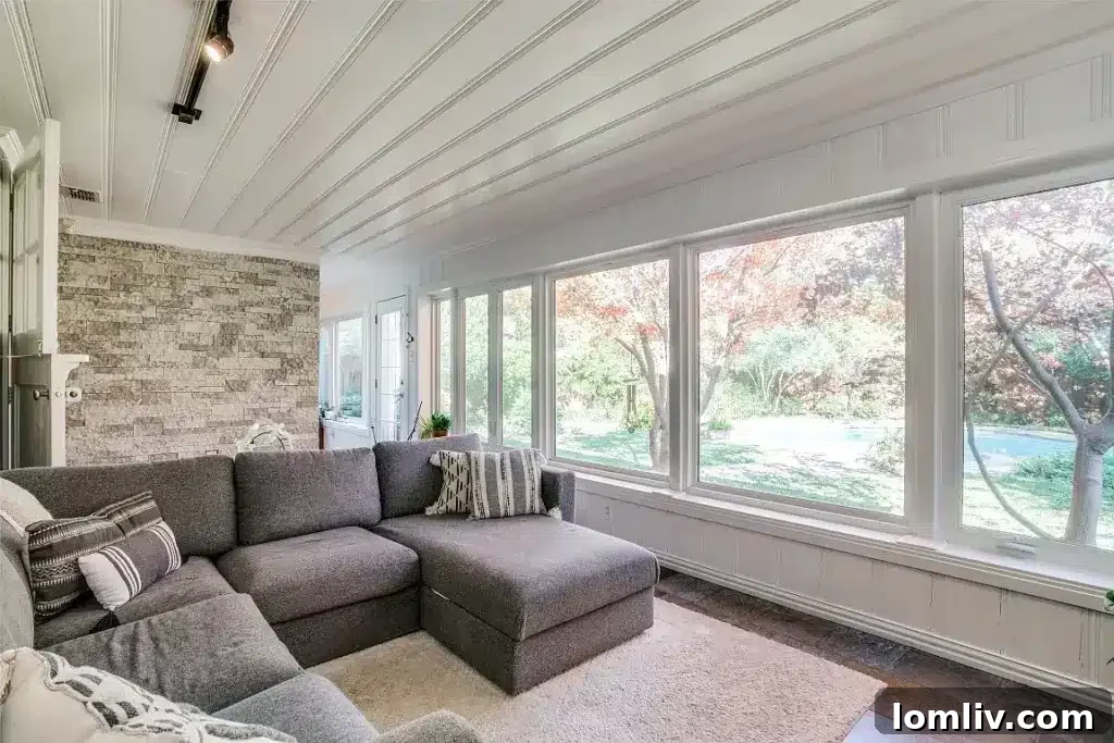 Luxurious main bathroom featuring a modern jetted tub, separate walk-in shower, and clean tilework for a spa-like feel.
