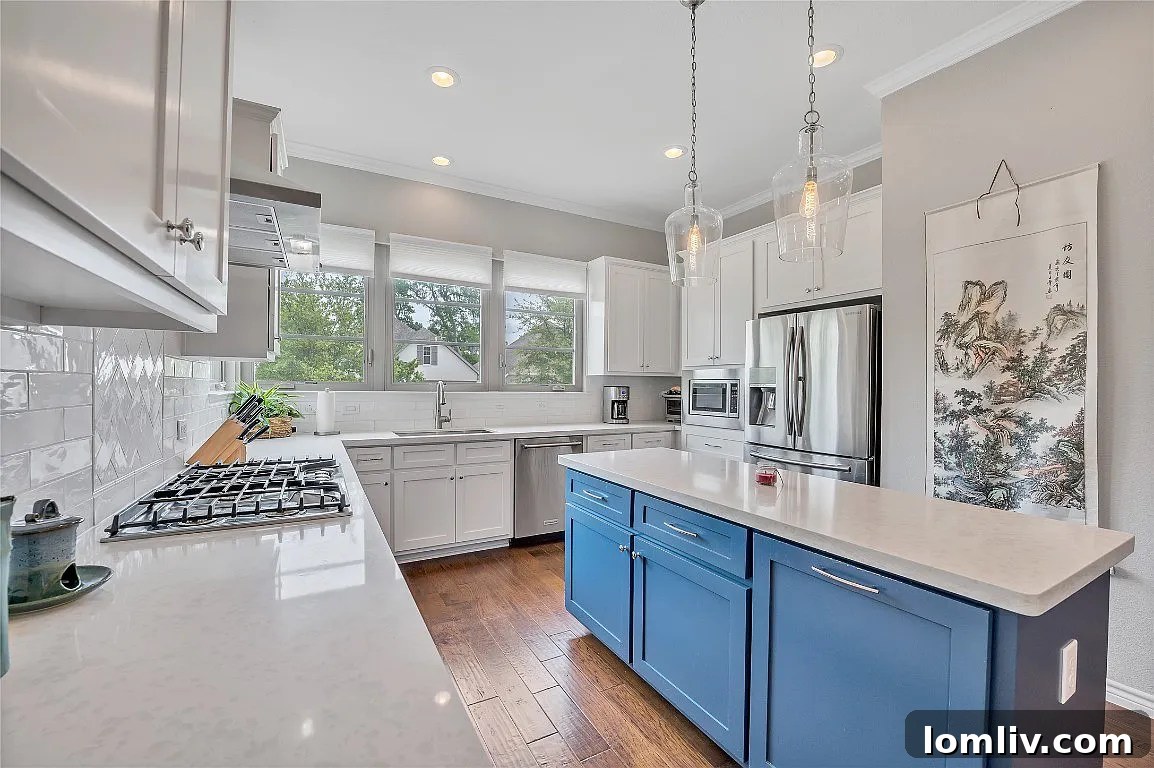 White kitchen with a pop of blue accent