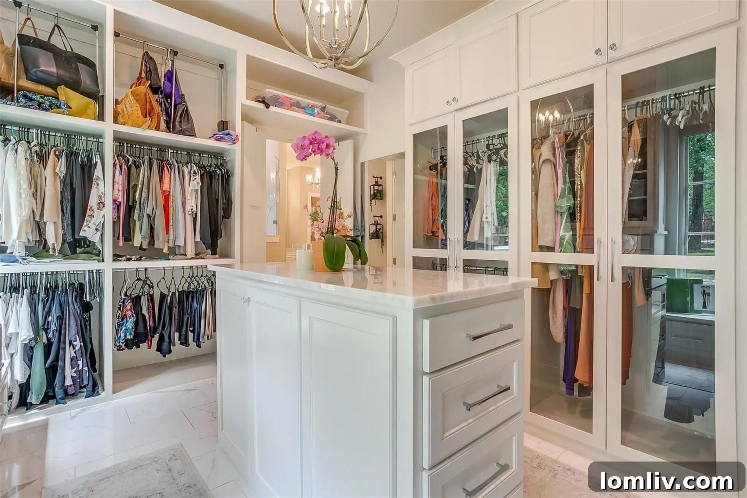 Luxurious closet room with hanging space and drawers