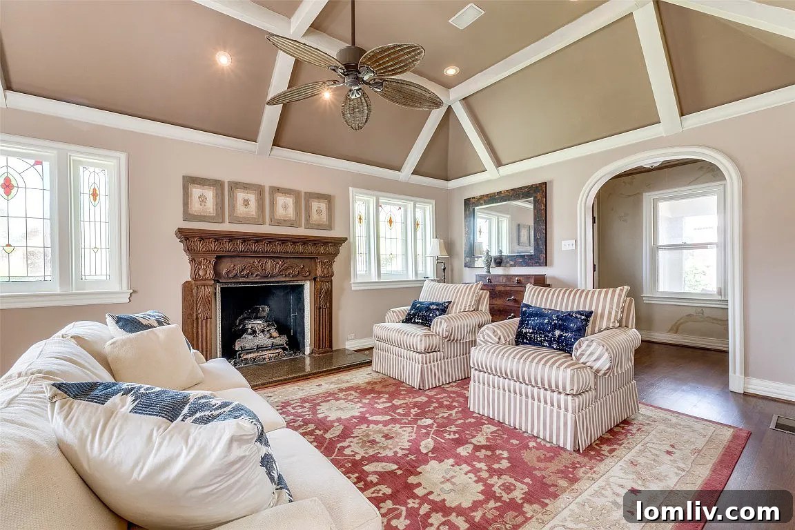 Ceiling with stylish fan and contrasting beams