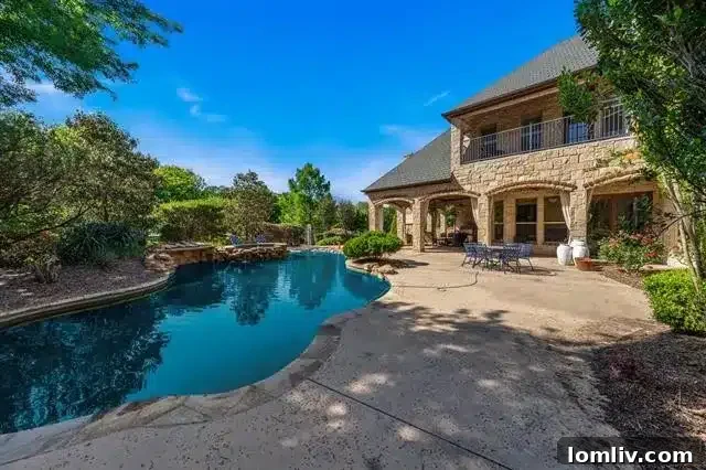 Backyard oasis with greenery and seating area