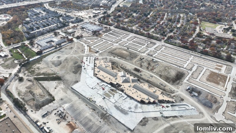 An aerial view of the Collin Creek redevelopment site, showing ongoing construction and prepared lots.