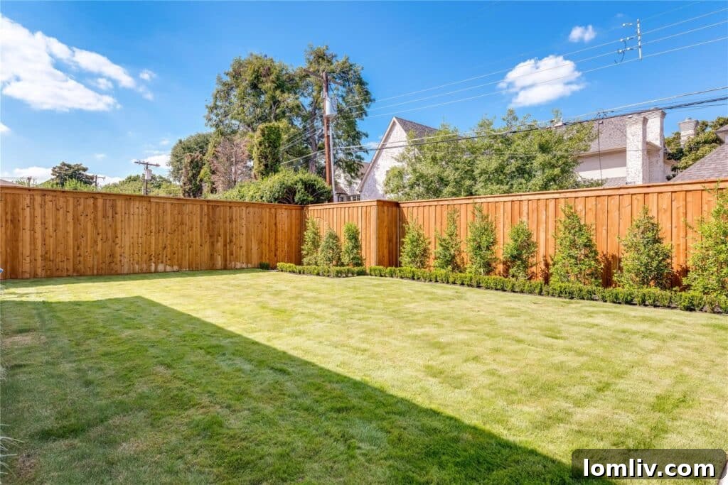 Close-up of the pristine front lawn and entrance of 7423 Greenbrier Drive