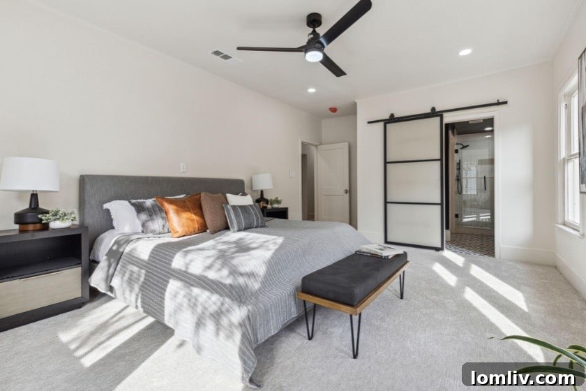 Black Paint and an Arch: The Magic Behind This M Streets Makeover 9 Elegant primary bathroom with dual vanities and modern fixtures