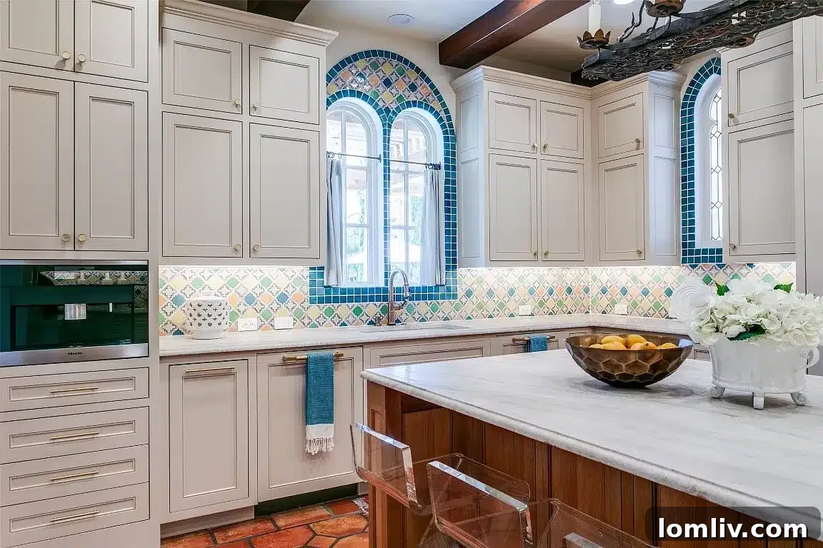 Updated kitchen with original Saltillo tile accents in Spanish Revival home