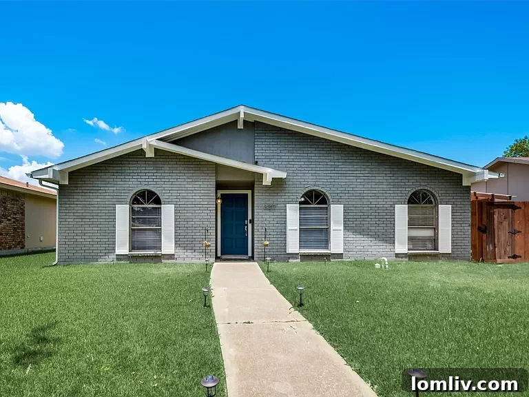 A renovated 1976 house in Garland with modern updates and a classic brick exterior.