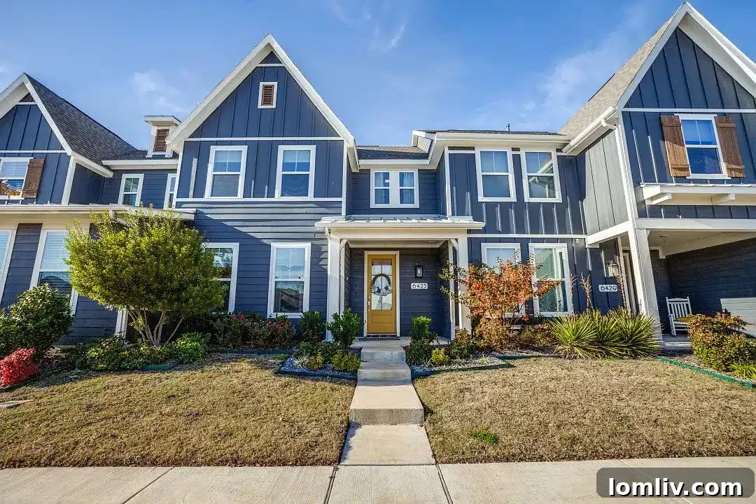 A modern townhouse exterior in Rowlett, part of the Homestead at Liberty Grove community.