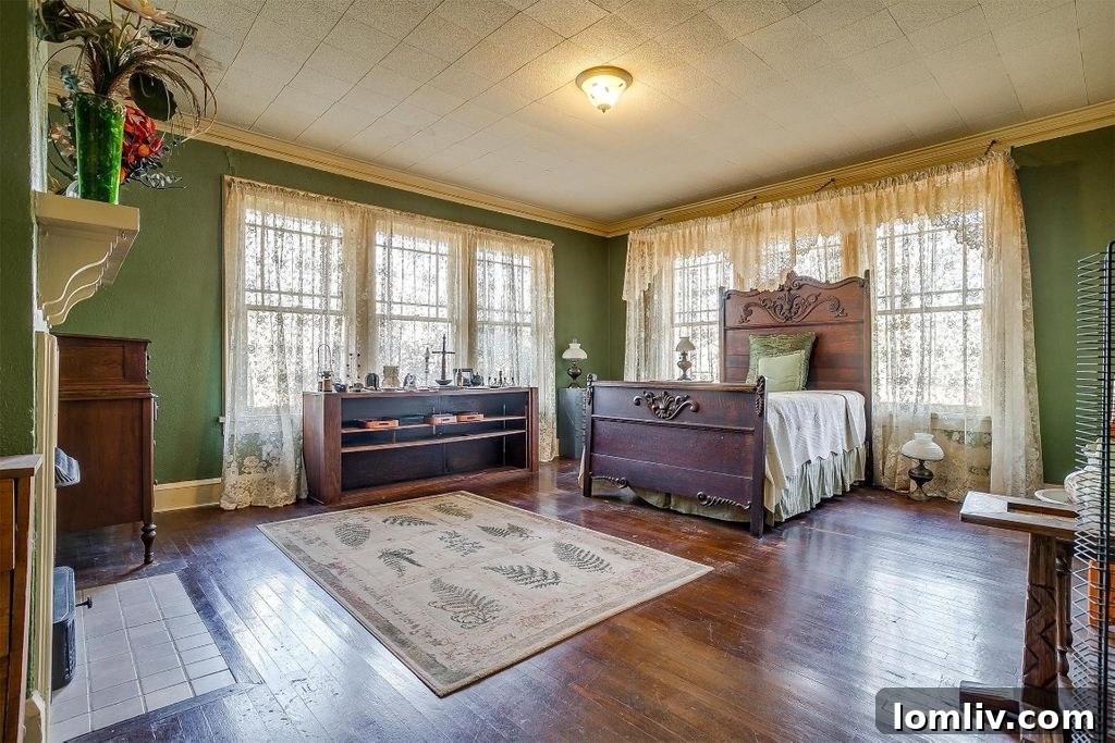 Primary Bedroom with Fireplace and Natural Light