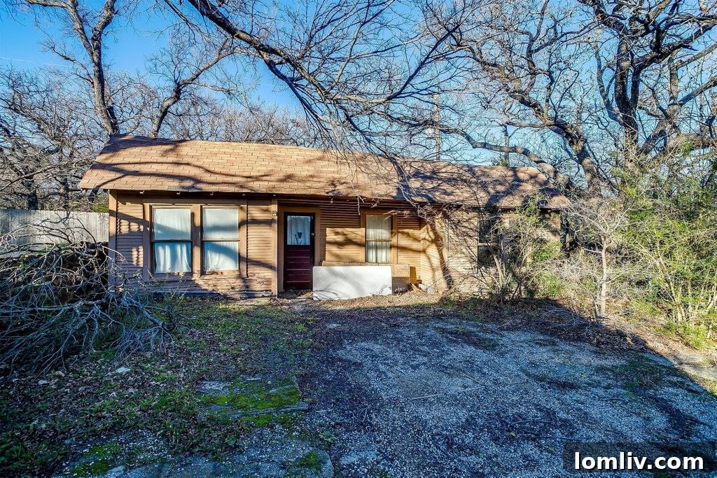 Bathroom with Renovation Potential: Beadboard and Wallpaper