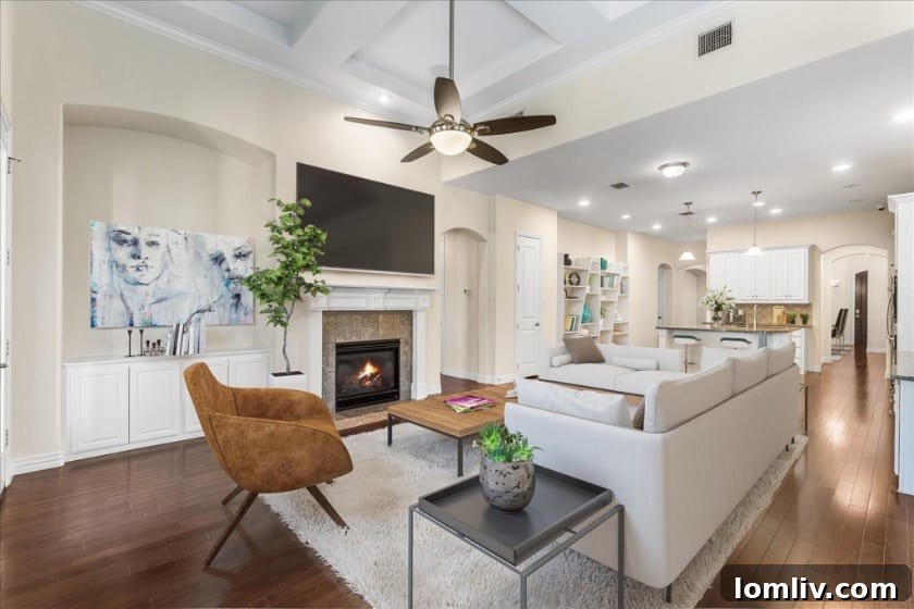 Virtually staged open-concept living area showcasing neutral decor, abundant natural light, and spacious design