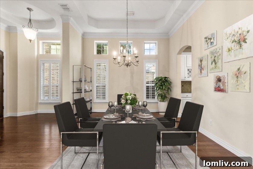 Expansive and modern kitchen featuring a large central island, premium stainless steel appliances, and generous counter space for culinary enthusiasts