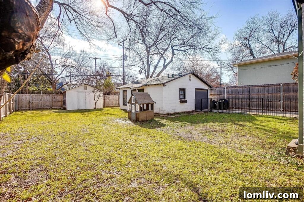 Exterior view showing the attached single-car garage with a porte cochere, leading to the guest suite.