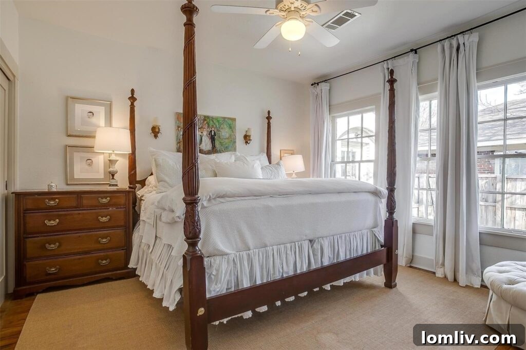Bright and spacious bedroom with ample windows, offering a tranquil retreat.