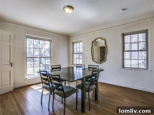 Hollywood Heights: Where Colonial Grandeur Meets Drunk Brick Whimsy 8 Charming entryway of the Hollywood Heights home, featuring the Drunk Brick exterior