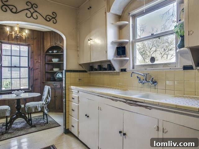 Hollywood Heights: Where Colonial Grandeur Meets Drunk Brick Whimsy 9 Front view of the historic Dallas home at 1006 Clermont Street