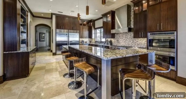 A stunning view of the outdoor pool and entertainment area at Jermaine O’Neal’s Southlake estate.