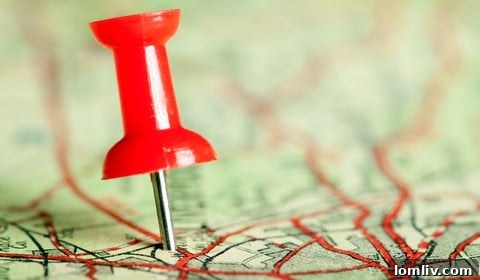 Couple looking at a map, planning a cross-country move