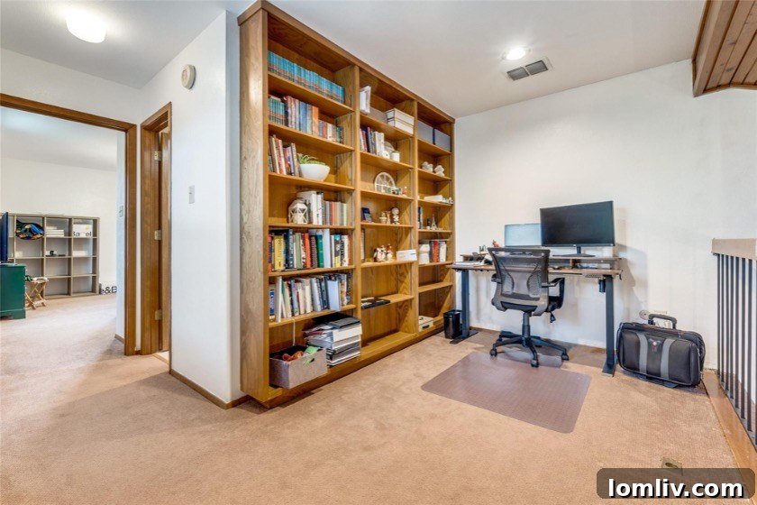 Primary bathroom with a vintage-style bathtub and sliding glass door