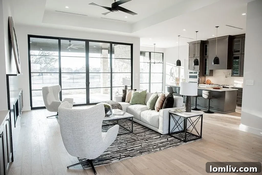 Detail view of the elegant built-in shelving and fireplace in the living room of this East Texas luxury home