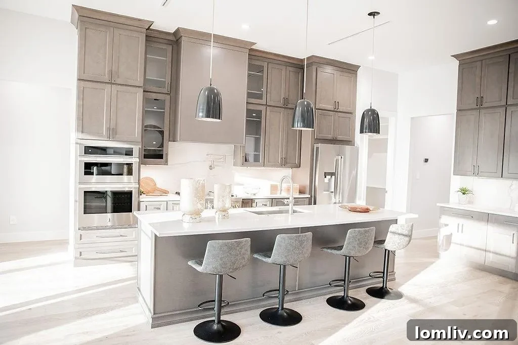 Close-up of the Jennair professional range and custom cabinetry in the luxury kitchen at 94 Ryder Cup Trail