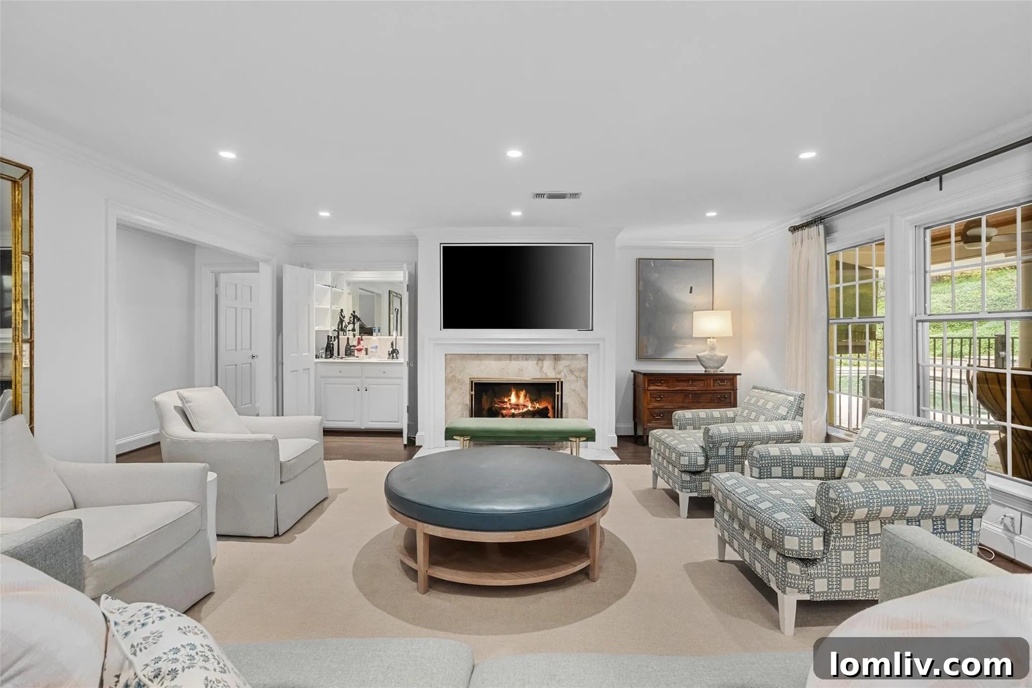 Renovated Living Room with Hardwood Floors and Natural Light