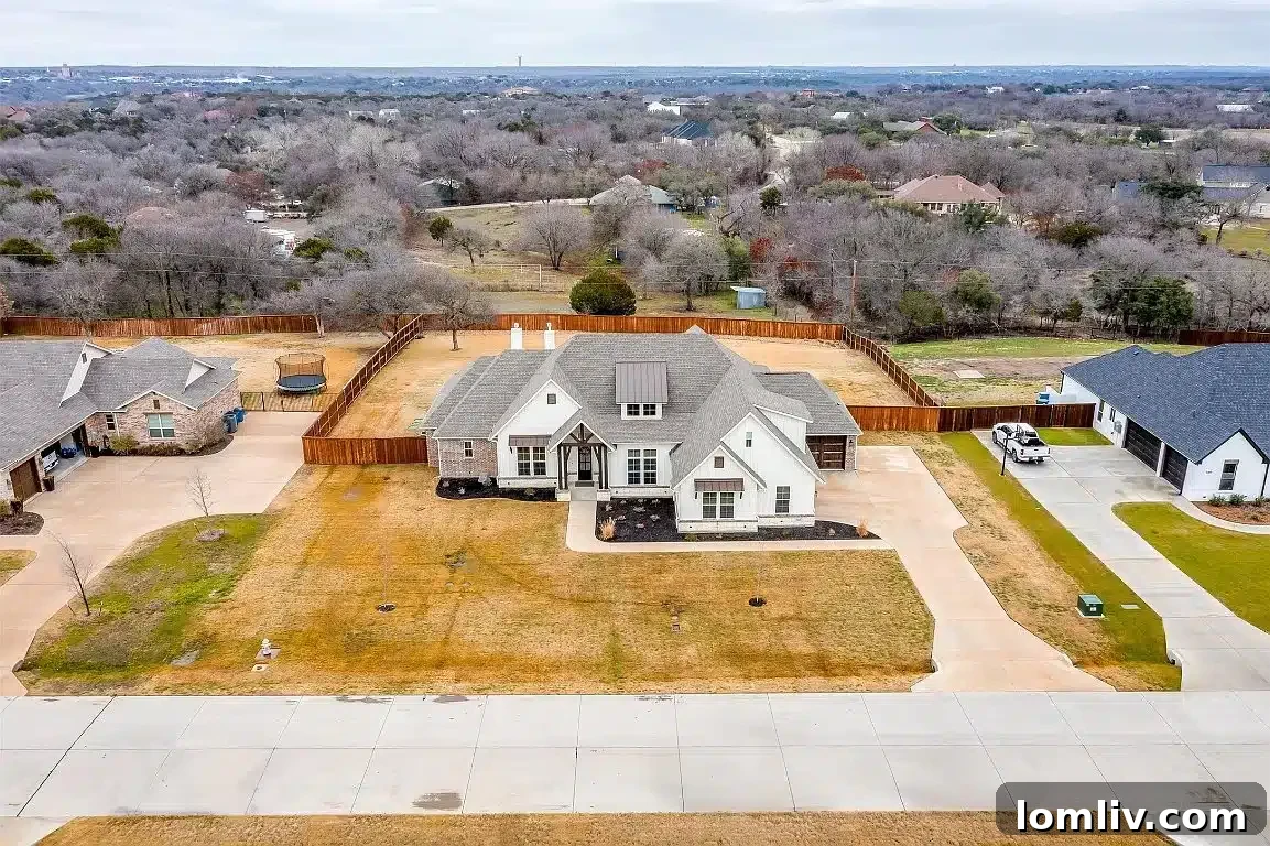 Spacious front and back yards on a three-quarter acre lot, perfect for football practice.