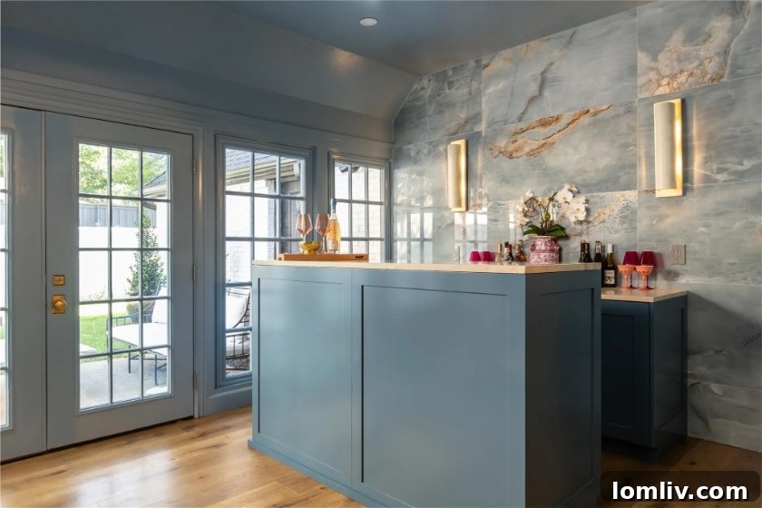 After image of the new bar area, transformed from a sunroom with elegant design and lighting