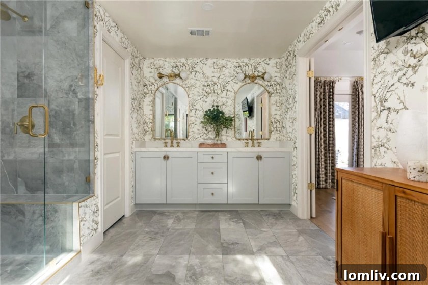 Vibrant and artfully designed powder room with bold wallpaper and stylish mirror