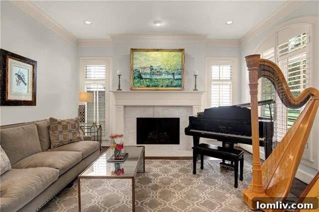 Open concept kitchen with marble countertops, high-end appliances, and large island