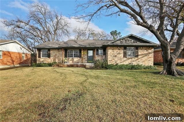 Eastwood Hills home exterior with updated landscaping and front door