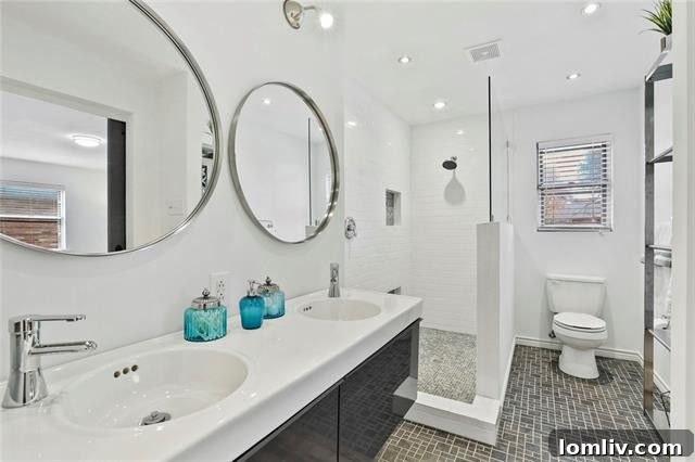 Bathroom with modern vanity and mirror