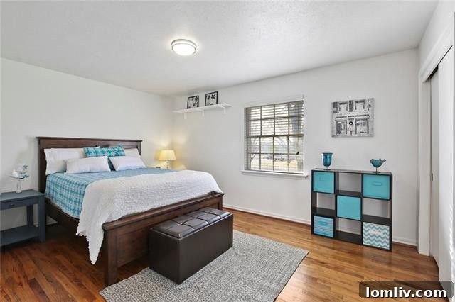 Hardwood floors in a secondary bedroom
