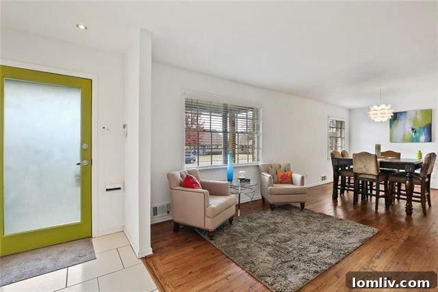 Kitchen view with light countertops and stainless steel appliances