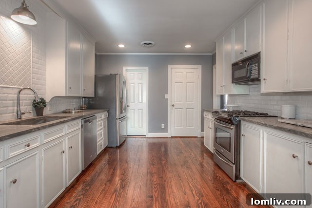 Recently updated galley kitchen with beautiful hardwood floors throughout 6110 Locke Avenue