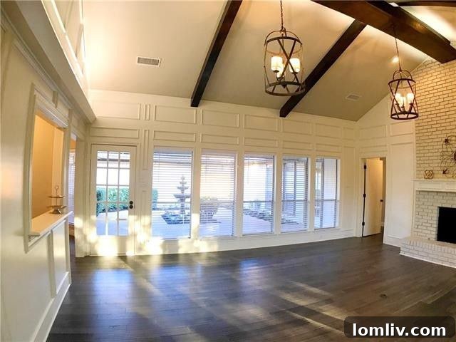 Dining area with stylish paneled walls and modern light fixtures, offering an elegant dining experience