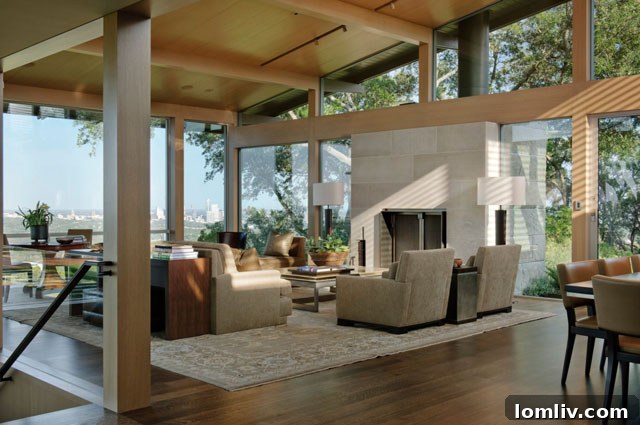 Architect Ted Flato Delivers Inaugural Frank Welch Memorial Lecture 2 Hillside House living room by Ted Flato in Austin, TX, showcasing seamless connection to nature through large windows and natural materials.