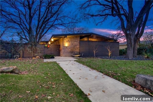 Front exterior view of the Arch Swank Mid-Century Modern home at 6216 Town Hill Lane