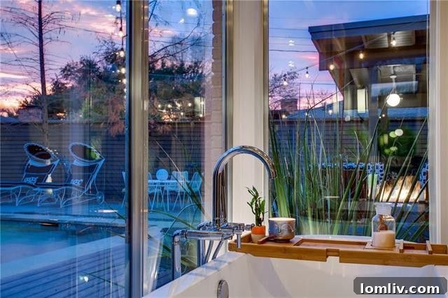 Another perspective of the master bath, highlighting its spaciousness and modern design