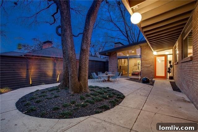 Side exterior view of the Arch Swank Mid-Century Modern home, showcasing architectural lines