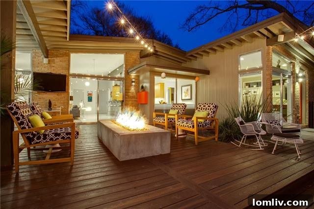 Lush backyard landscaping surrounding the pool, designed for privacy and beauty