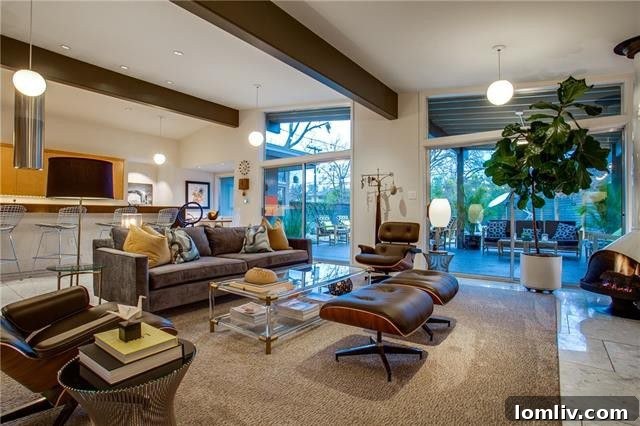 Stylish dining area with modern lighting and classic Mid-Century elements