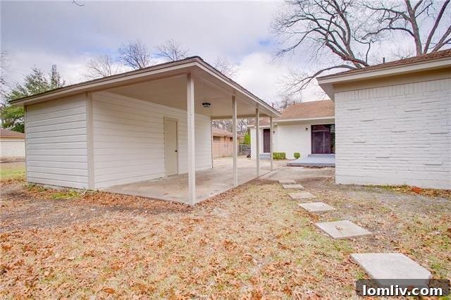 Modern floating vanity with dual sinks in a renovated bathroom