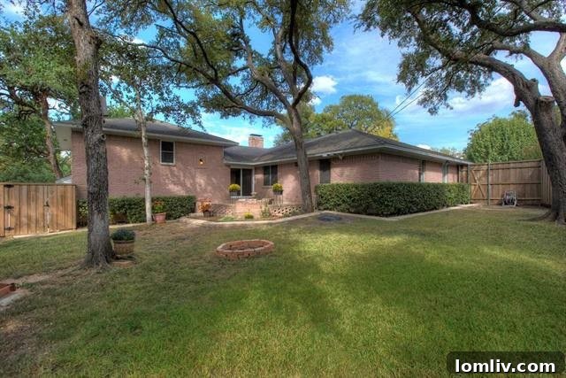 Expansive private backyard with mature trees and green space