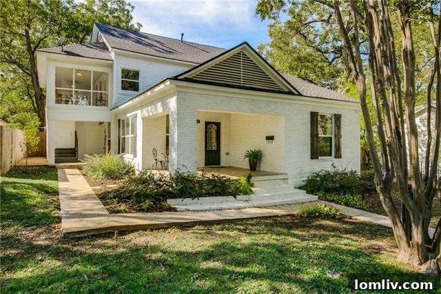 Open concept living area with fireplace in Kessler Park home