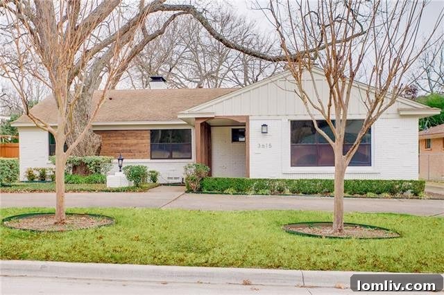 Refreshed exterior of a Druid Hills home with new windows and doors