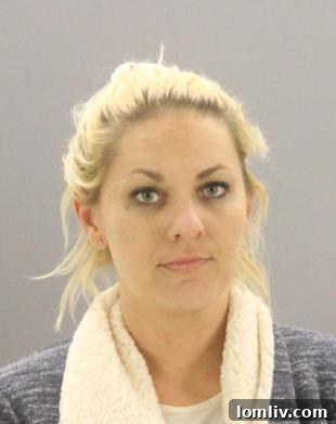 Mugshot of Kelli Russell, charged with felony theft in Dallas County.