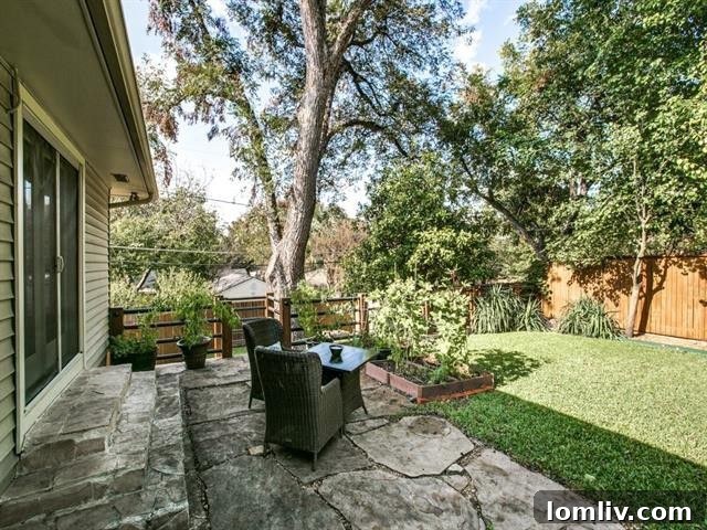 Merriman Park Masterpiece: Complete Living, Unmatched Price 13 Cozy patio area in the backyard, perfect for outdoor dining or lounging